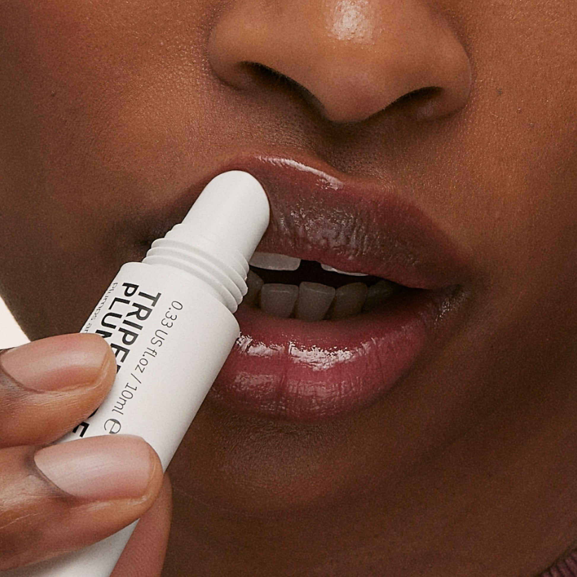 tripeptide-plumping-berry-lip-balm-x5 ApplicationBerry.jpg